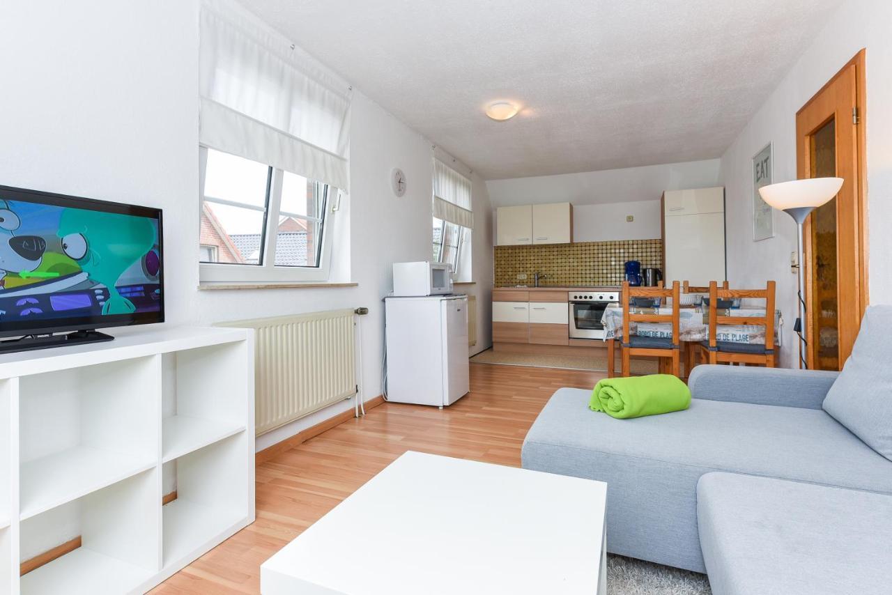 Ferienwohnungen im Haus Lieblingskoje Neuharlingersiel Exterior foto